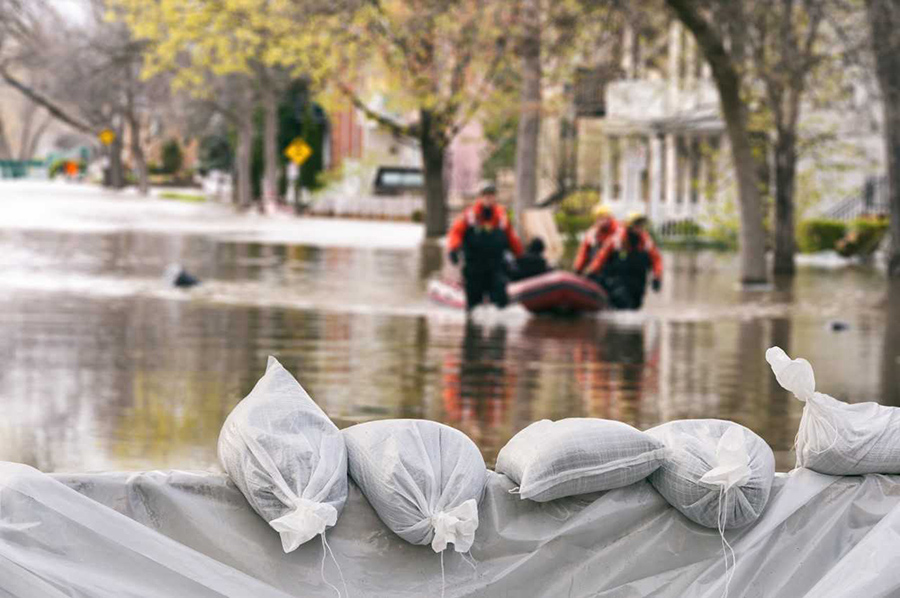 image of flood, sadbags, rescue