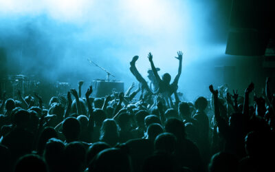 Crowd surfing during a musical performance